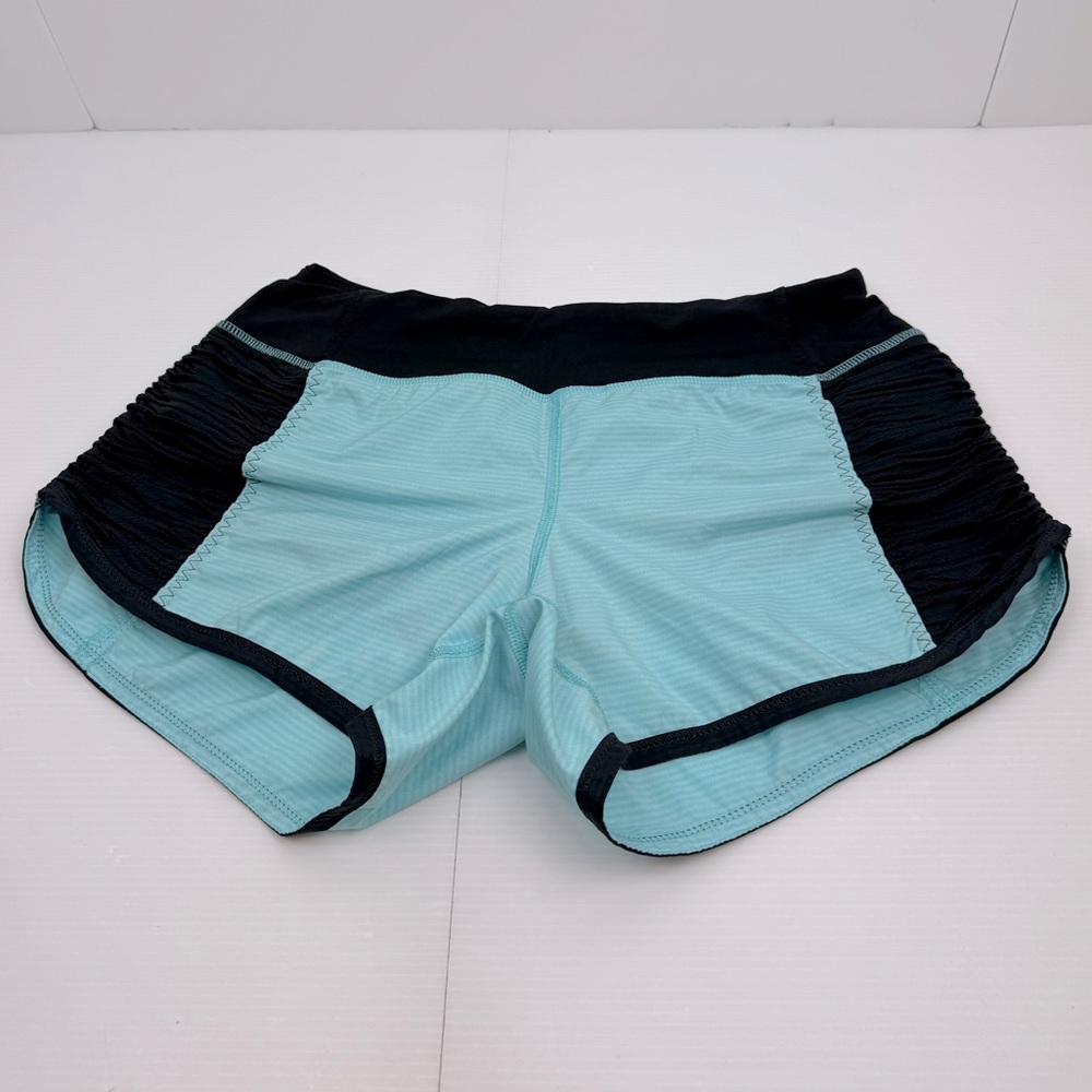 Lululemon Run: Bright At Night Aqua Tonka Stripe & Black Shorts Size 4 Women’s
